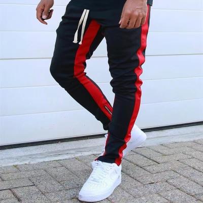 China custom LOGO Cotton Men Anti-wrinkle Joggers wear side stripe Tracksuits pants street wear fitness casual sports tracksuit sports wear pants men for sale