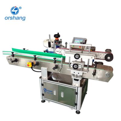 China Food in Pet Running Plastic Mineral Water Bottle Labeling Machine Vertical Automatic Label Printing Packaging Machine for sale