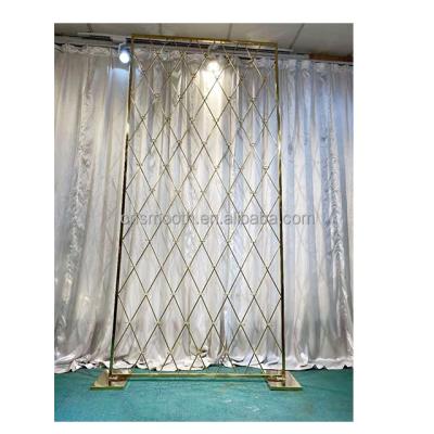 China Wedding Wedding Supplies Shiny Gold Wedding Stage Backdrop Metal Candle Wall Backdrop For Wedding for sale