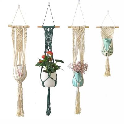 China Nordic Scandinavian Cotton Handwoven Rope Tapestry Style Macrame Basket Plant Decoration Pot Fringe Hanging Net Wall Hanging for sale