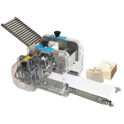 China Automatic Mold Packing Machine Dumpling Roll Spring Restaurant Papad Making Machine Table Maker for sale