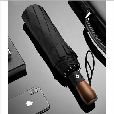 China Craftsman Standard Size Windproof Automatic Open Folding Umbrella With Wooden Handle for sale