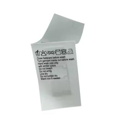 China Customized  UHF RFID Clothing Tag Textile Laundry Care Tag Wash Mark Label for sale