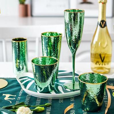 China Custom Stocked Drinking Glass Gold Rim Personalized Tall Wine Glass Set Green Wine Glass for sale