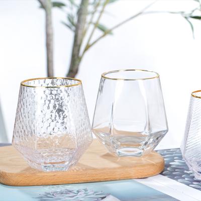 China Fashion minimalist transparent hammer hexagonal glass with gold rim for sale