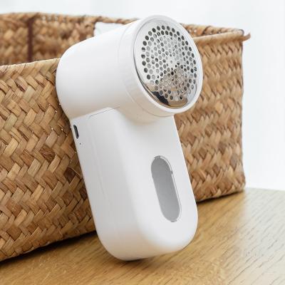 China Viable Battery Operated Portable Shaver Clothes Sweater Curtain Wool Fuzz Removing Machine Fiber Remover for sale