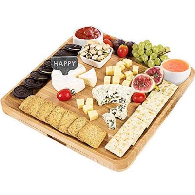 China Sustainable bamboo cheese board set with slate cheese board and tool holder, includes 4 cheese knives for sale