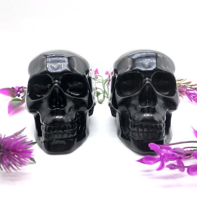 China Wholesale Natural Europe Skulls Gemstones Obsidian Crystal Skulls For Mind Healing Souvenirs Gifts for sale