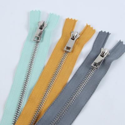 China Auto Lock Good Quality 5# Auto Sliders Silver Plating Narrow End Metal Zipper For Garment And Pocket for sale