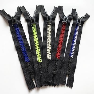 China Other New Product #8 Teeth Plastic Colored Close End Zipper Plastic Resin Zipper Plastic Alphabet Zipper for sale