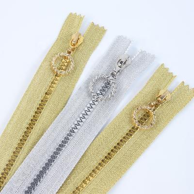 China Other wholesale plastic zipper 5# end-end fabric zipper gold silver teeth special resin zipper for garment for sale