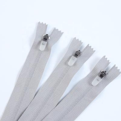 China Other 3# Spring Slider Auto Lock High Quality Nylon Reverse Transparent Rubber Nylon Zipper For Garment for sale