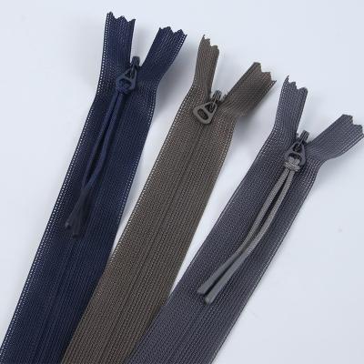 China Color Nylon Tape Auto Lock Skirted Hidden Zipper 3# Invisible Lace Zipper For Garment Mesh Tape Pillow for sale