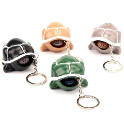 China PVC Novelty Metal Head Squeeze Wholesale Funny 3D Sea Turtle Key Chain Alloy Keychain Various Toys for sale