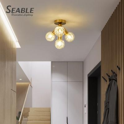 China Bedroom Creative Attic Modern Surface Mounted Designer Simple Ball Around Ceiling Decorative Glass Lamp for sale