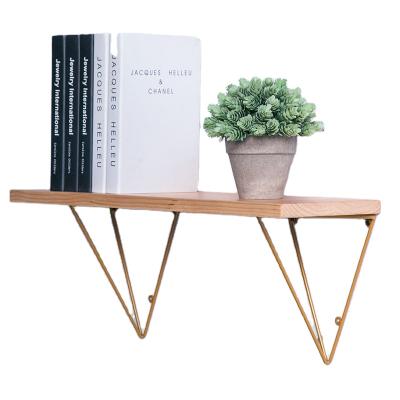 China Sustainable Wooden Wall Mounted Floating Shelf With Golden Triangle Metal Brackets For Living Room, Bedroom, Kitchen Storage Wood Rack for sale