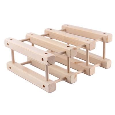 China Viable wooden wine bottle stretch rack creative kitchen accessories pine wood wine rack for sale