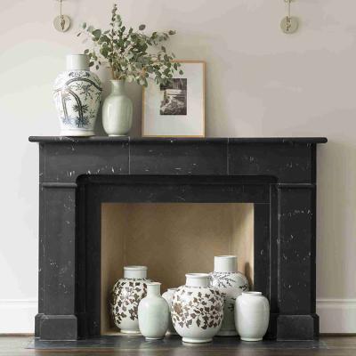 China Traditional Home Used Black Marble Freestanding Fireplace Surround Mantel for sale