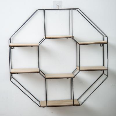 China Simple Minimalist Hexagon Ironwork Home Decoration Hanging Wall Basket Storage Rack for sale