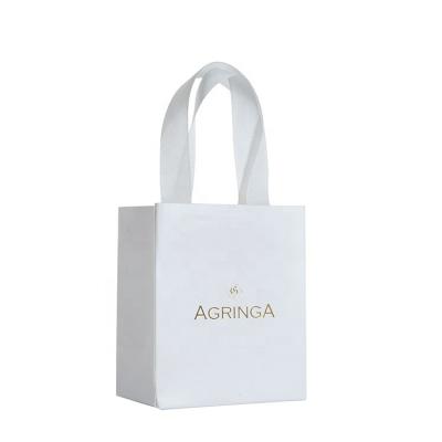 China Wholesale Recyclable Custom Logo Low Cost White Paper Print Wedding Gift Biodegradable Jewelry Bag With Handle for sale