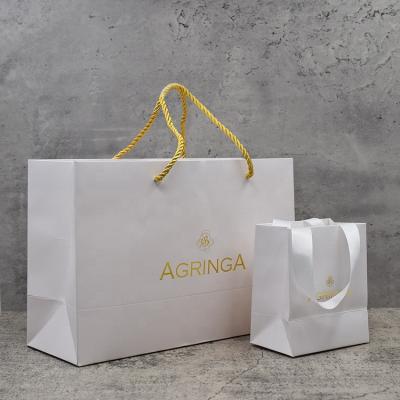 China Recyclable Custom Logo Print Luxury Cosmetic Jewelry Gift Packaging Paper Shopping Bag With Handle for sale