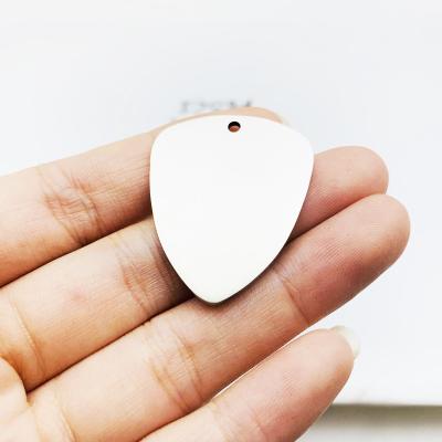 China DIY Personalized Lettering Romantic Guitar Picks Custom Sample Font Pattern Titanium Steel Key Chain Pendant Custom Made Metal Key Chains for sale