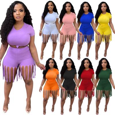 China Plus Size Women Clothing Solid Color Short Sleeve Suit Women Tassel Sport QUICK DRY Shorts Two Piece Set for sale