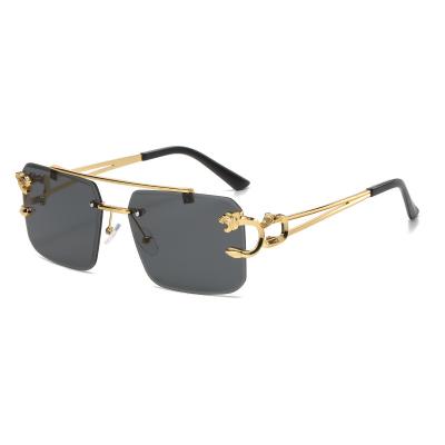 China European fashion sunglasses and American fashionable metal gold square sunglasses frameless snub head tiger sunglasses for sale