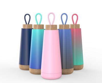 China New Production Sustainable Wooden Lid Stainless Steel Vacuum Insulated Portable Water Bottle for sale