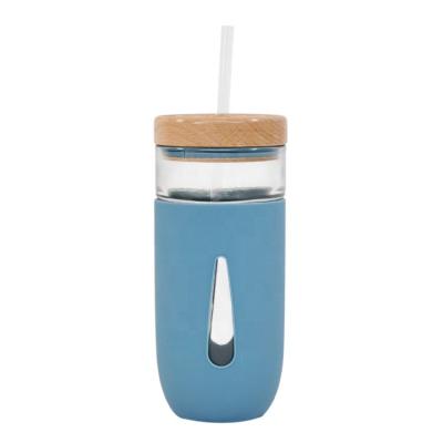 China Sustainable New Design Bottle Silicone Sleeves Travel Glass Mug With Lid And Straw Wood Wholesale for sale