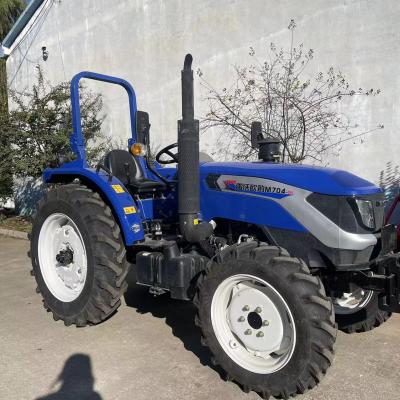 Китай Four Wheel Agricultural Farm Tractor With Front End Loader And Digger Tractor продается