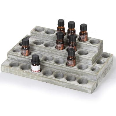 China Storage 4 Layer Essential Oil Display Rack Nail Polish Display Stand Essential Oil Holder for sale