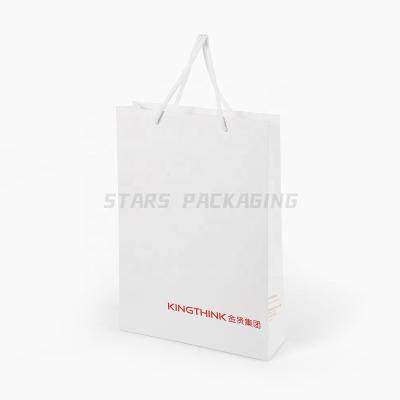 China Custom High Quality Embossed Recycled Art Paper Gift Bag Eco Friendly Materials Art Paper Gift Bag Eco Friendly Recyclable Bag With Logo for sale