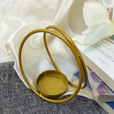 China Morden Handcraft Vintage Style Luxury Circular Candlestick Metal Home Decor Gold Candlestick Holder for sale