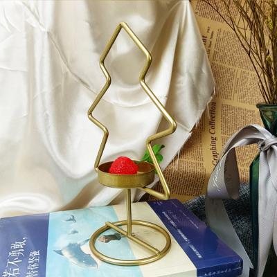 China Irregular Shape Luxury Creative Gold Candlestick Tree Morden Christmas Metal Home Decor Candlestick Stand for sale