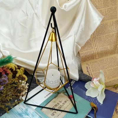 China Luxury Nordic Black Hollow Morden Metal Candlestick Stand Irregular Shape Metal Gold Geometric Candlestick for sale