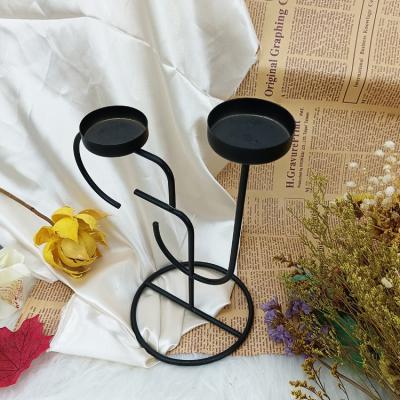 China Morden Luxury 2 Heads Unique Black Home Party Decoration Table Candlestick Metal Candlestick Holders for sale