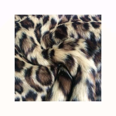 China Toy Good Quality Hot Sale Super Soft Luxury Thick Fluffy Leopard Print Faux Fur Fabric For Coat for sale