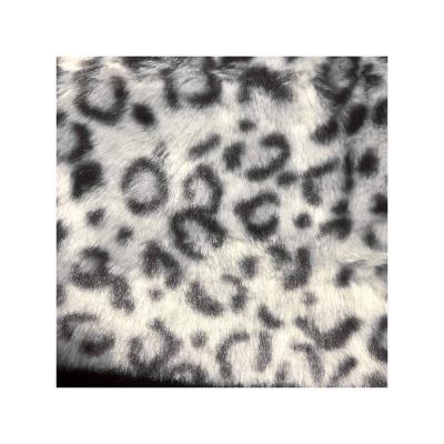 China Toy Super Soft 2.5cm Short Hair Jacquard Leopard Printed Fake Artificial Faux Fur Fabric Maker for sale