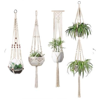 China Bohemian Handmade Home Decor Woven Cotton Rope Macrame Hanging Macrame Plant Indoor Outdoor Hanger for sale