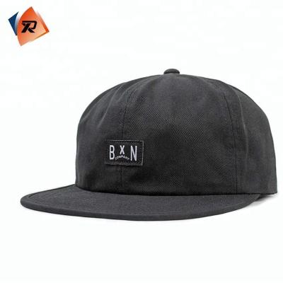 China JOINT Logo 5 Panel Leather Patch Unstructured Flat Brim Baseball Hat for sale