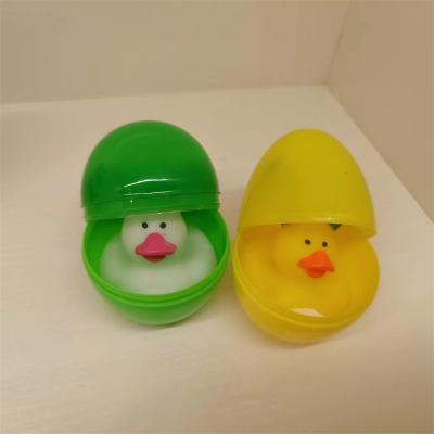 China Squeeze-sounding Dabbling Toy Eco Friendly Baby Bath Swimming Toy Rubber Duck Toy With Eggshell for sale