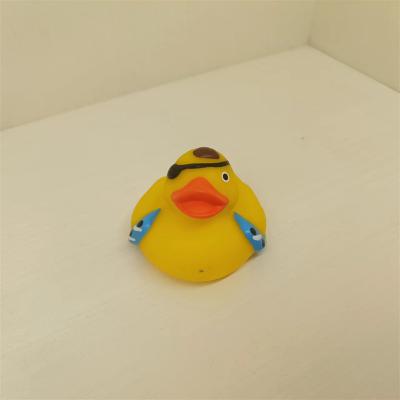 China Squeeze-sounding Dabbling Toy Cheap Promotional Floating Mini Yellow PVC Plastic Duck Baby Bath Toy for sale