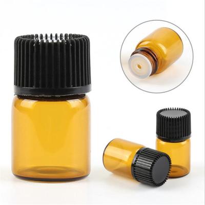 China Personal Care 1ml 2ml 3ml 5ml Small Amber Glass Bottles With Hole Reducer And Black Cap For Sample Essential Oil Perfumes Vial Bottles for sale