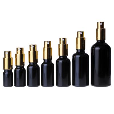 China Personal Care 5ml 10ml 15ml 20ml 30ml 50ml 100ml Empty Portable Glass Spray Liquid Bottle Black Travel Refillable Fine Mist Spray Bottle for sale