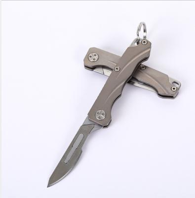 China Quick-Change Lightweight Titanium Folding Knife Quick-Change Titanium Alloy Scalpel Box Cutter Cutting Knife Sharp Hand Box Opener for sale