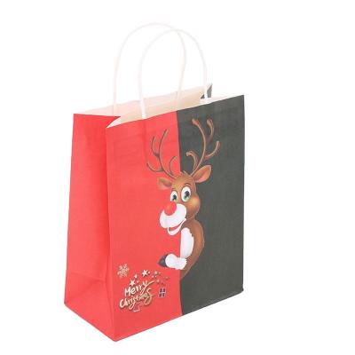 China OEM Service Disposable White Christmas Kraft Paper Snowflake Custom Paper Clothing Bags For Shopping Gifts for sale