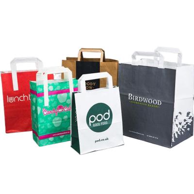 China Wholesale Disposable Custom Logo Clothing Packaging Gift Business Resealable Bags Take Away Craft Paper Bags With Handles for sale