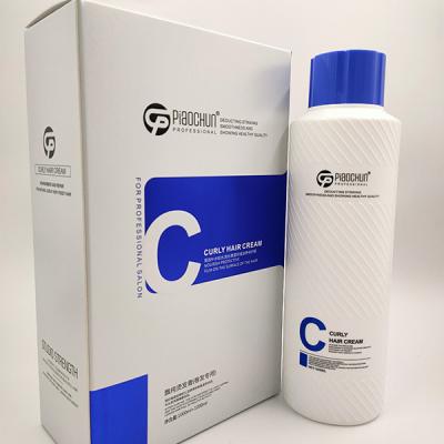 China Logotipo OEM Crema natural para el cabello rizado con aceite de coco para el cabello rizado. en venta