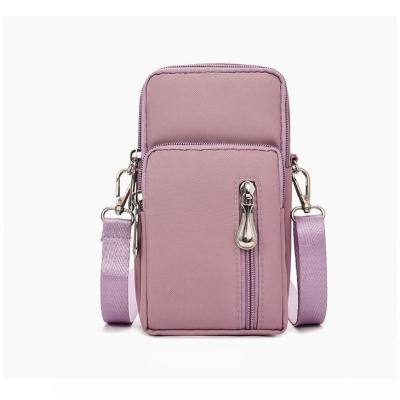 China Single Bag Women High Quality Large Capacity Mobile Wallet Solid Color Fashion Shoulder Zipper Straddle Bag for sale